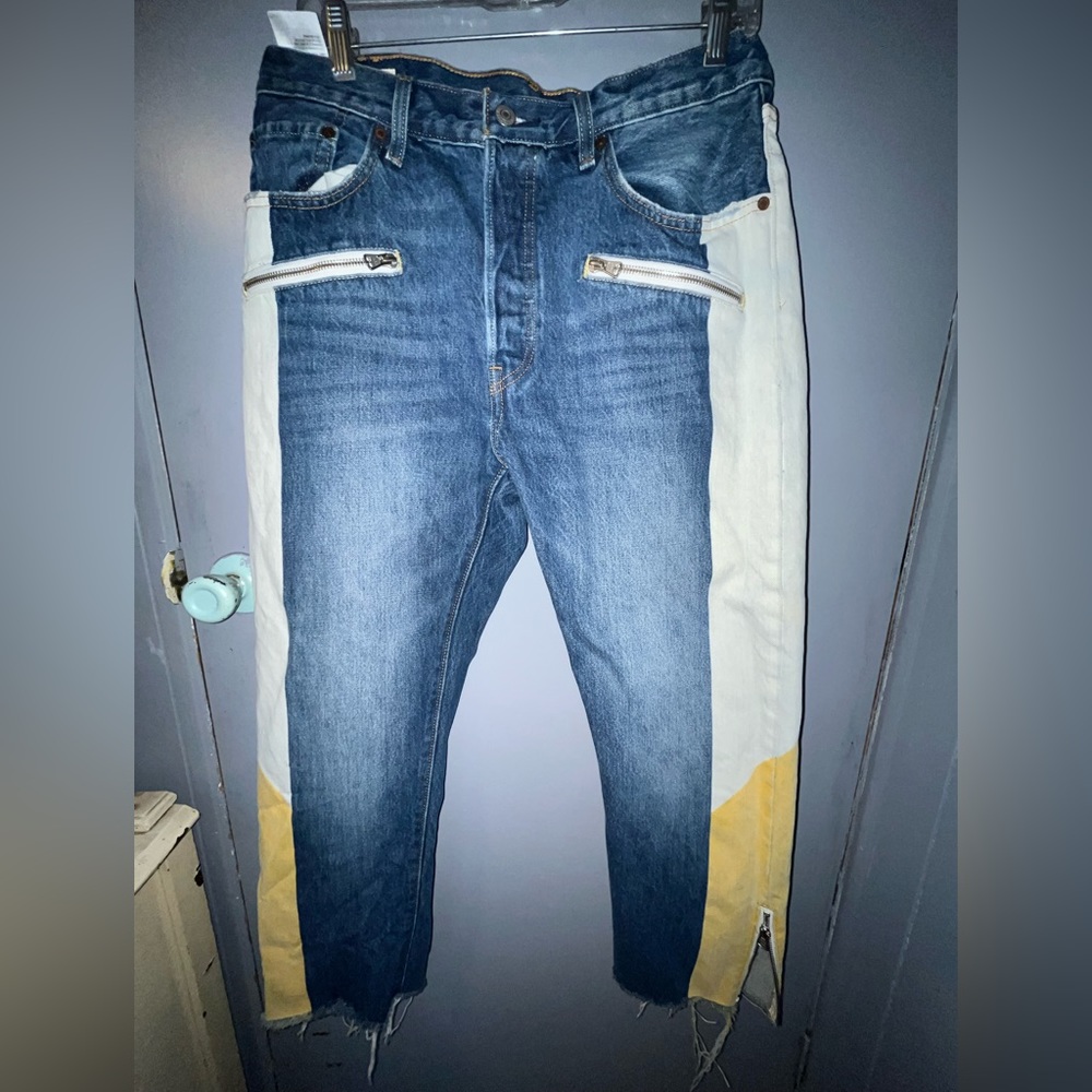 Levi’s, size 8/12.. doesn’t say size on any tags.. I’m typically a 4/6 (med)..